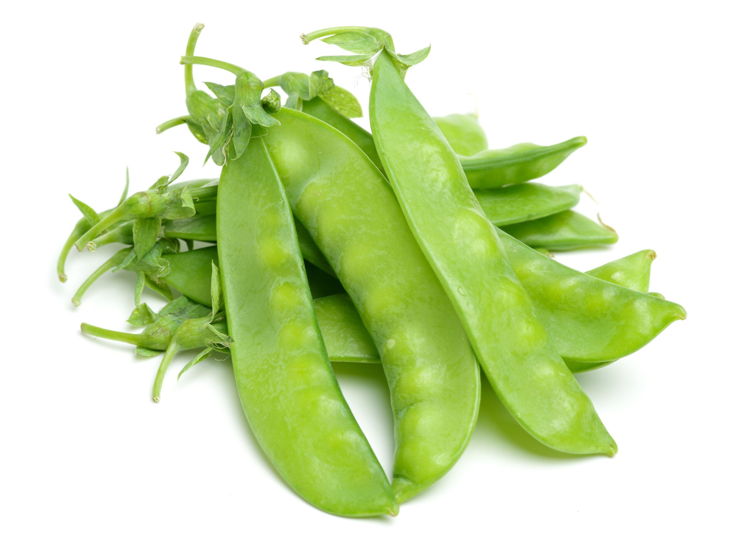 Green Snow Peas, Organic Vegetables Stacked Together, Isolated on White